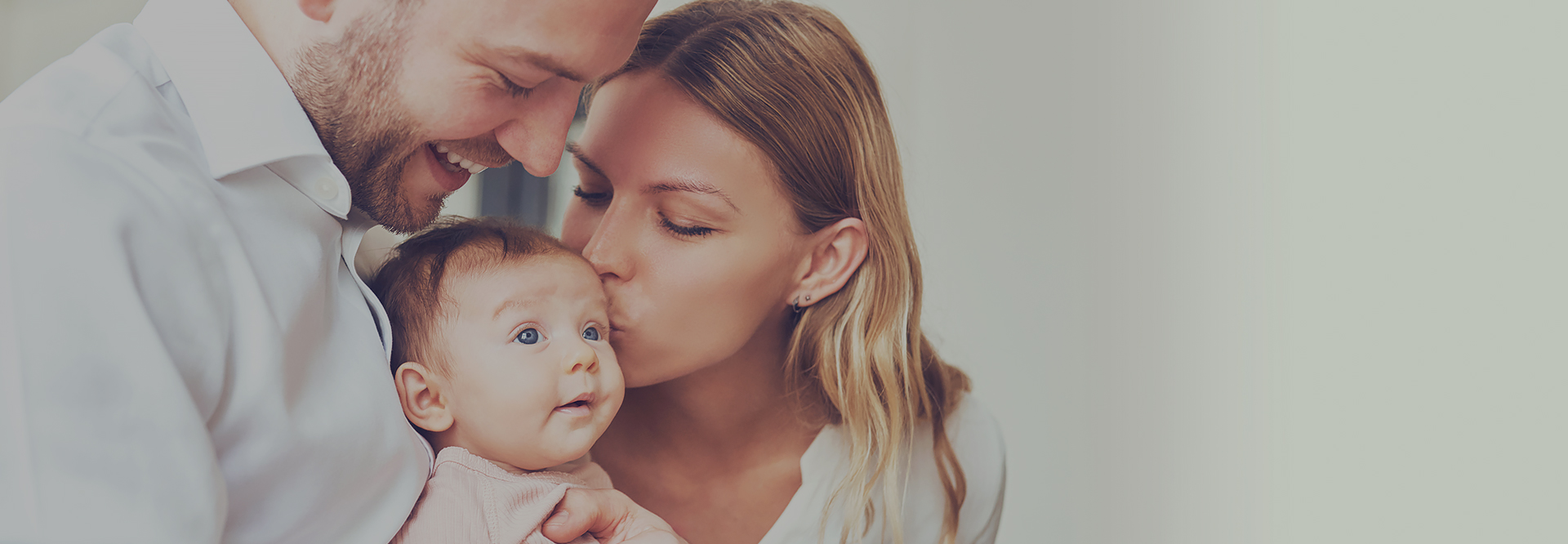 A Happy couple with baby- Surrogacy in Ukraine